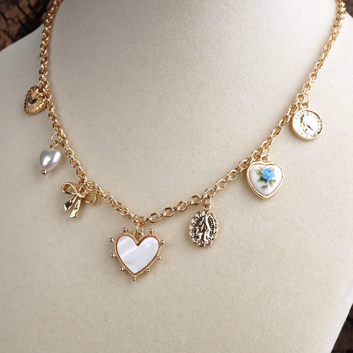 Multi-Charm Heart Necklace in Gold Tone - Image 3