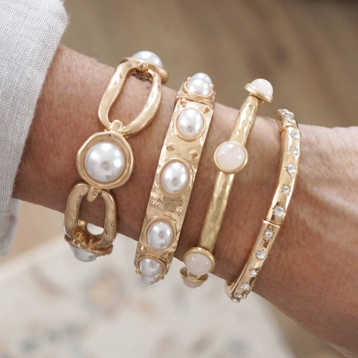Stretchy Bangle with Pearls in Worn Gold - Image 3