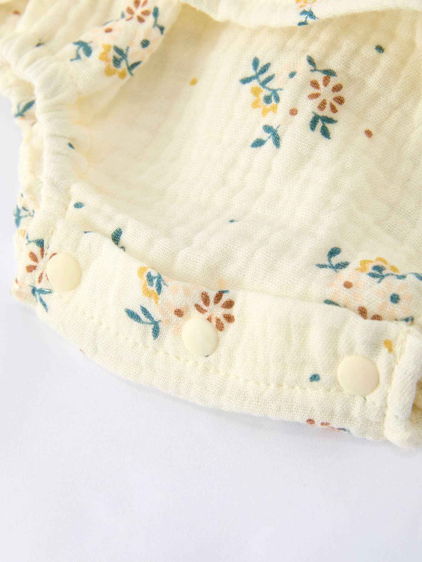 Spring Floral Smocked Ruffle Romper and Hat Set - Image 4